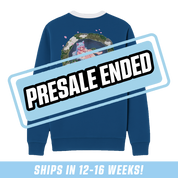 Blue crewneck with white collar featuring pixelated lily pads and "GAMER SUPPS X SILVERVALE" text on chest